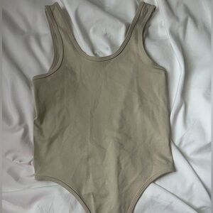 Tilly’s tan tank body suit